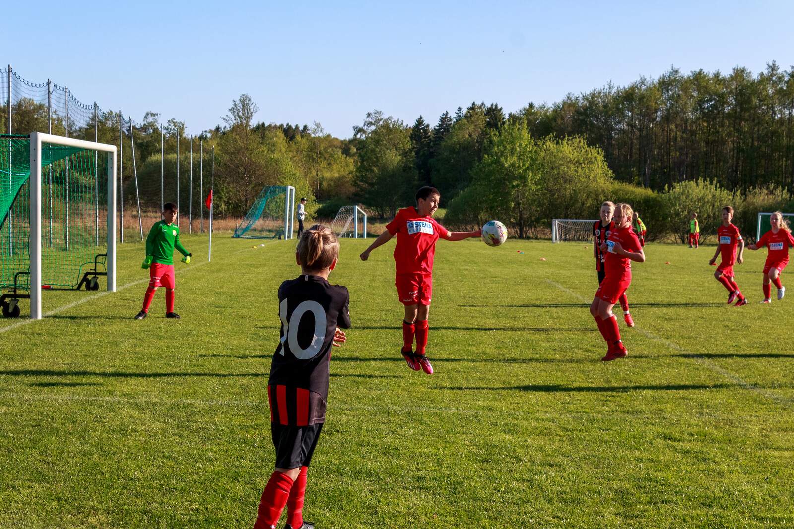 Youth football training with a ball